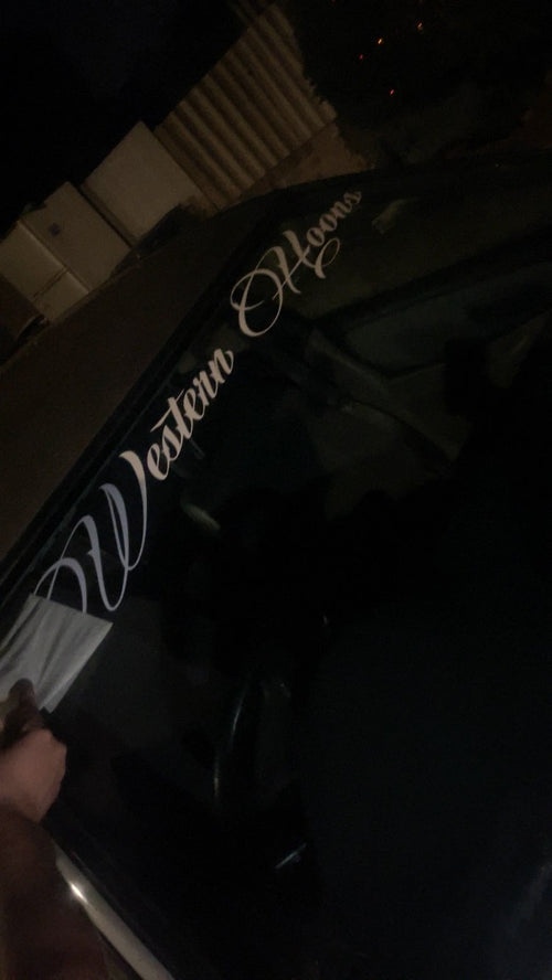 Western Hoons white cursive script-style font