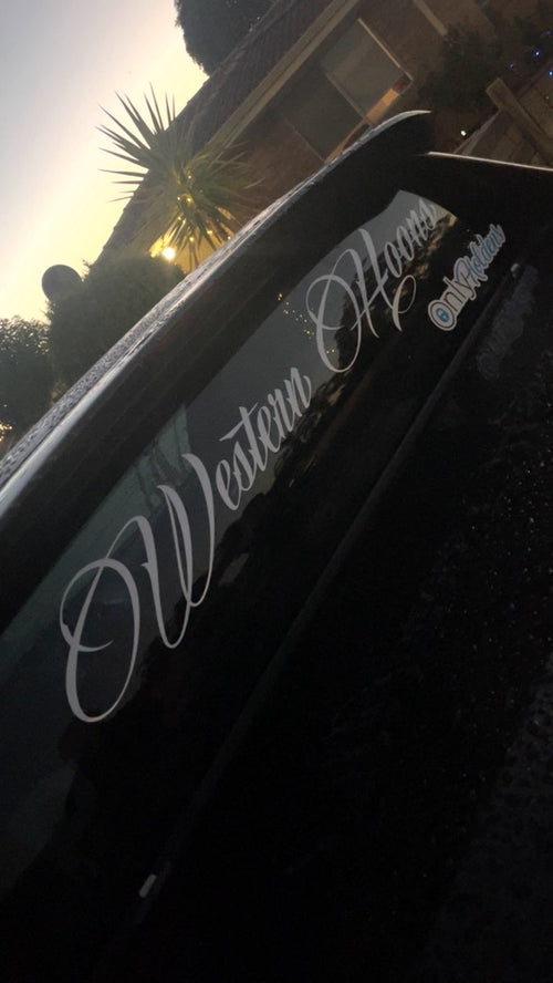Western Hoons white cursive script-style font