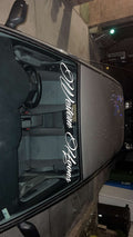 Western Hoons white cursive script-style font