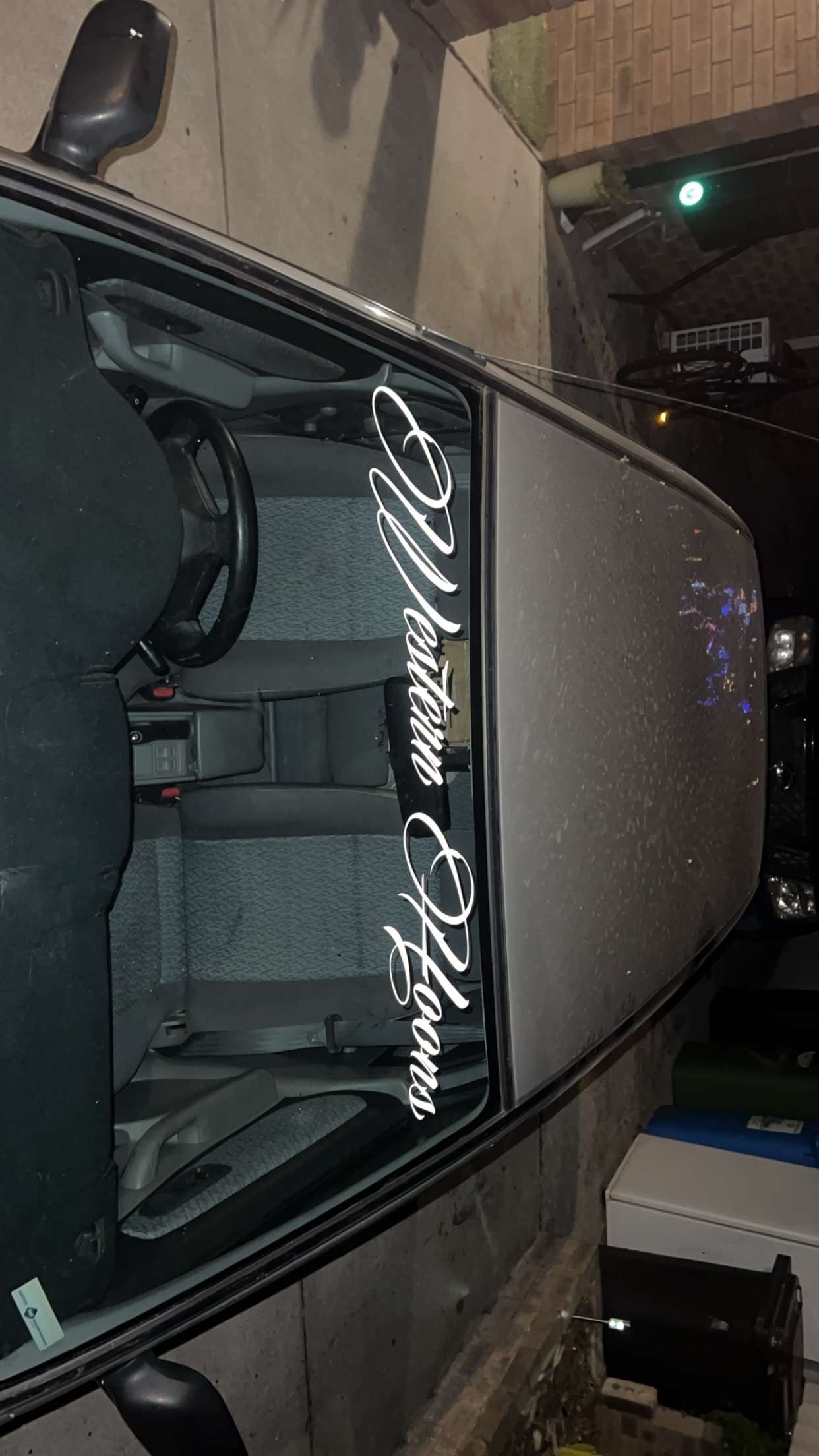 Western Hoons white cursive script-style font